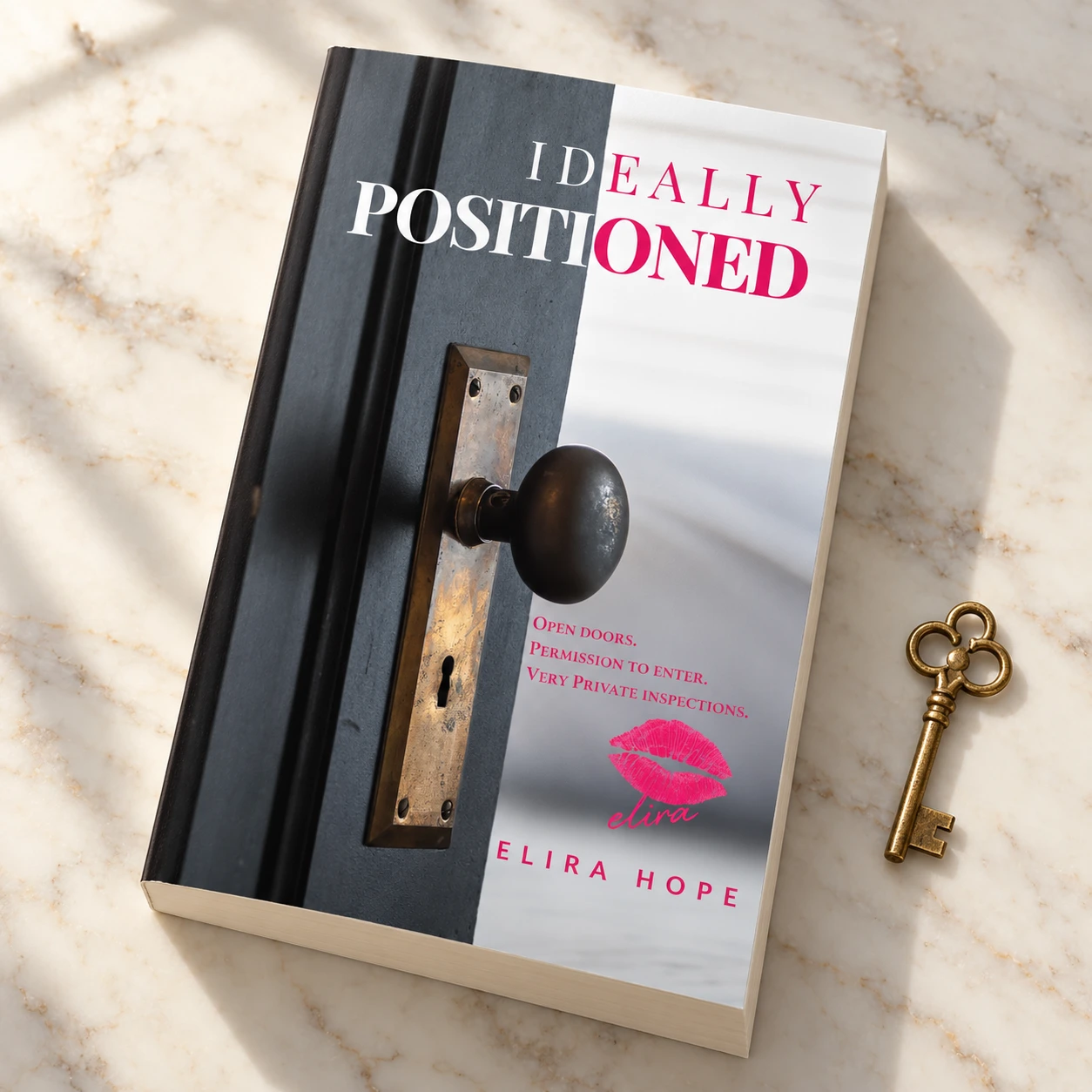 Paperback on marble beside a gold key — digital styling mockup